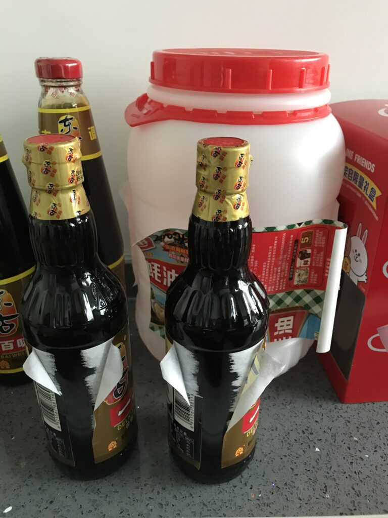 Water-based labeling adhesive scrap material