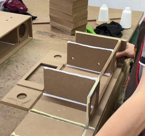 Speaker assembly glue