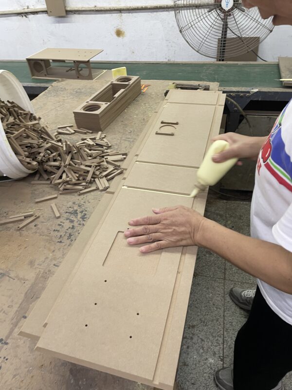 Speaker assembly glue