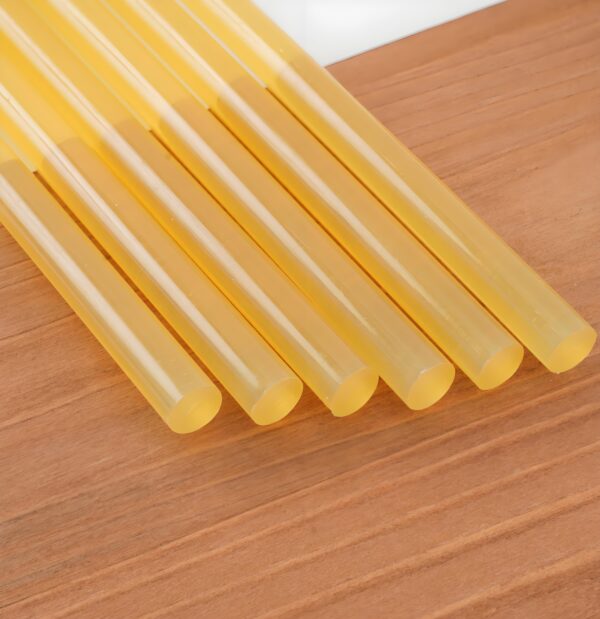 Yellow hot melt glue stick